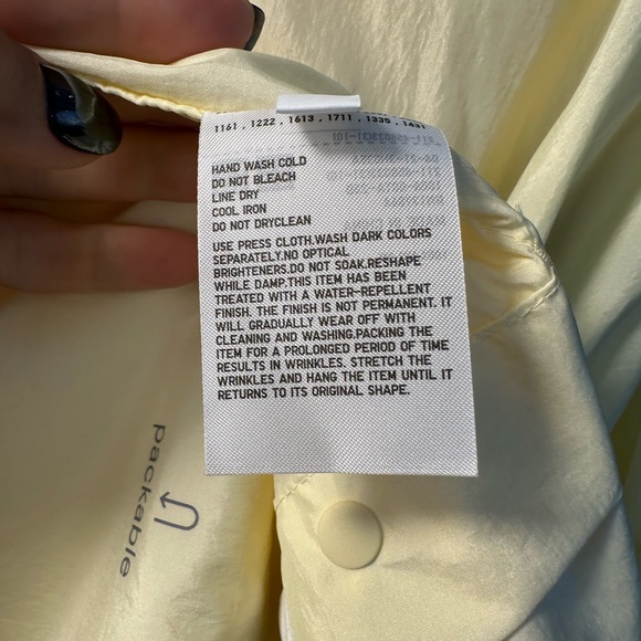 Uniqlo U packable yellow over sized hooded rain poncho. - Picture 12 of 14
